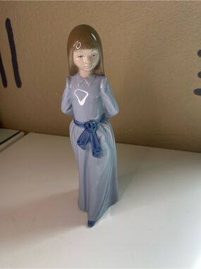 Nao by Lladro Glossy Light Blue Porcelain Girl Figurine with Dark Blue Sash
